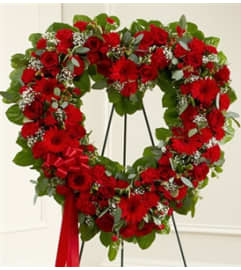 Always Remember Heart Tribute. An arrangement by Elegant Florist.