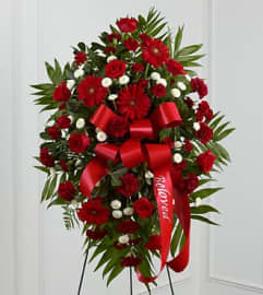 Treasured Memories™ Standing Spray Red and White. An arrangement by Elegant Florist.