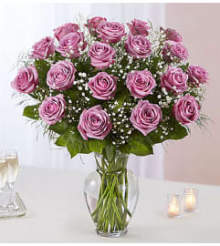 Lavender Roses Two Dozen. An arrangement by Flowers of Jacksonville.