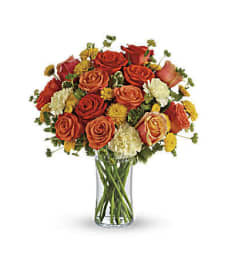 The Citrus Kissed. An arrangement by Flowers of Jacksonville.