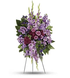 Lavender Remembrance Spray. An arrangement by Flower Stop.