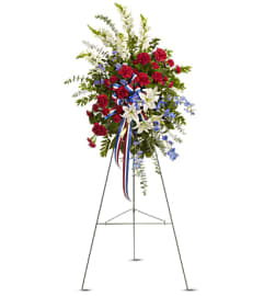 Sacred Duty Spray. An arrangement by Flowers of Jacksonville.