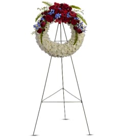 Reflections of Glory Wreath. An arrangement by Flowers of Jacksonville.