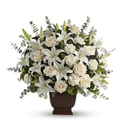 Loving Lilies and Roses Bouquet. An arrangement by Flowers of Jacksonville.