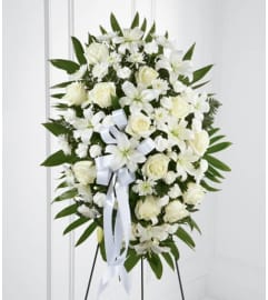Exquisite Tribute Standing Spray. An arrangement by Seasons Change Designs.