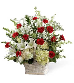 In Loving Memory. An arrangement by Seasons Change Designs.