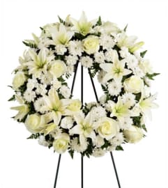 Angelic Tribute Wreath. An arrangement by Seasons Change Designs.