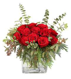 Holiday Sensation. An arrangement by Elegant Florist.