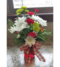 A Very Merry Christmas. An arrangement by Zaisers Florist and Greenhouse.