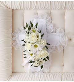 Cross Casket Pillow. An arrangement by Elegant Florist.