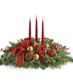 Christmas Centerpiece With Candles. An arrangement by Elegant Florist.