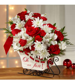 Holiday Ride. An arrangement by Dupree's Root 88 Garden Center and Florist.