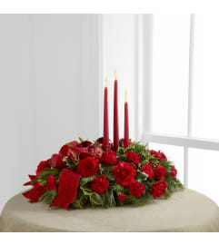 Seasons Greetings Centerpiece w/Candles. An arrangement by Dupree's Root 88 Garden Center and Florist.
