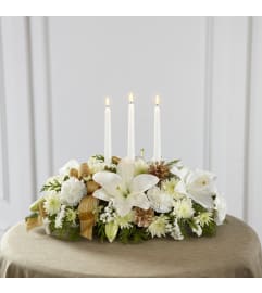 Seasons Glow Centerpiece. An arrangement by Dupree's Root 88 Garden Center and Florist.