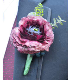 CUSTOM GARDEN BOUTTONIERRE. An arrangement by Flowers by Priscilla.
