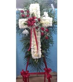 cross of faith. An arrangement by Howard Beach Florist.