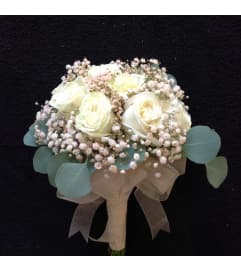 Peach Wedding. An arrangement by You and I Flowers and Gifts.