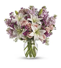 The Blossoming Romance. An arrangement by Flowers of Jacksonville.