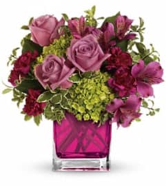 Splendid Surprise TEV20-2. An arrangement by Jennifer's Flowers and Gifts.