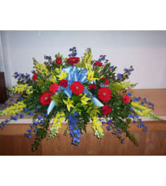 Colorful Memories Spray. An arrangement by Doyle's Flower Shop.