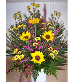 You'll Always be my Sunshine Basket. An arrangement by Doyle's Flower Shop.
