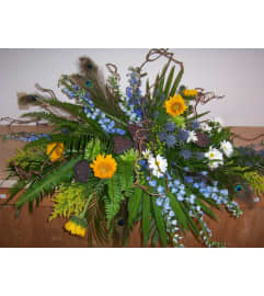 Natural and Earthy Spray. An arrangement by Doyle's Flower Shop.