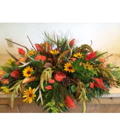 Hunters Tribute Spray. An arrangement by Doyle's Flower Shop.
