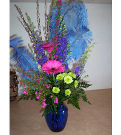 Peek a Boo. An arrangement by Doyle's Flower Shop.