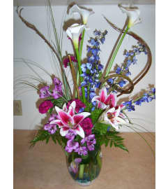 Dramatic Entrance. An arrangement by Doyle's Flower Shop.