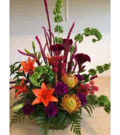 Exhuberance. An arrangement by Doyle's Flower Shop.