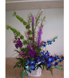 Indigo Blue. An arrangement by Doyle's Flower Shop.