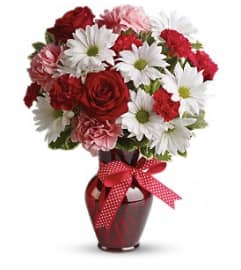 Teleflora's Hugs and Kisses Bouquet. An arrangement by Love Floral.