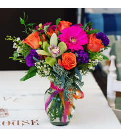Think Happy. An arrangement by Loyalist Flowers.