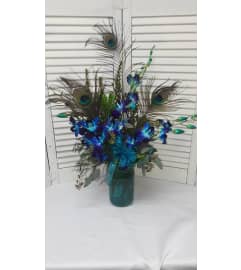 Peacock Paradise. An arrangement by Belak Flowers.