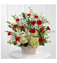 Loving Memory Basket. An arrangement by Sonia's Florist.