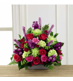The Warm Embrace™ Arrangement. An arrangement by Flowers of Jacksonville.