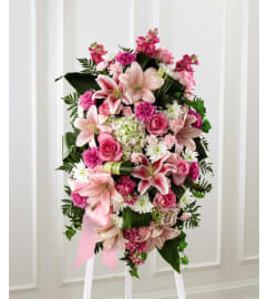 The Gently into the Ever-After™ Standing Spray. An arrangement by Flowers of Jacksonville.