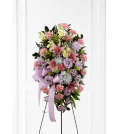 The Blessings of the Earth™ Easel. An arrangement by Flowers of Jacksonville.