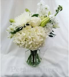 The Pearl. An arrangement by Petal Pushers Flower and Gift Shop. The Pearl. An arrangement by Petal Pushers Flower and Gift Shop.