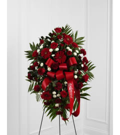 The Treasured Memories Standing Spray. An arrangement by Flowers of Jacksonville.