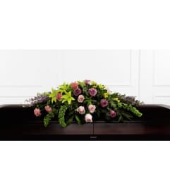 Forever Beloved Casket Spray. An arrangement by Flowers of Jacksonville.