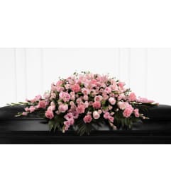 The Sweetly Rest™ Casket Spray. An arrangement by Flowers of Jacksonville.