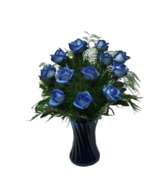 12 Blue Roses Arranged in a Vase. An arrangement by Awesome Blossom.
