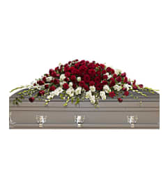 A Garden of Grandeur Casket Spray. An arrangement by Flowers of Jacksonville.