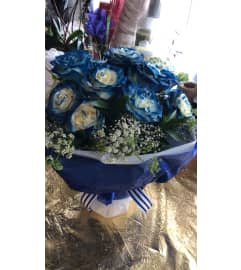 True Blue Love Bouquet. An arrangement by Flamingo Floral and Gifts.