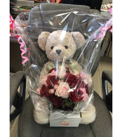 Teddy Bear and Flower Bouquet. An arrangement by Flamingo Floral and Gifts.