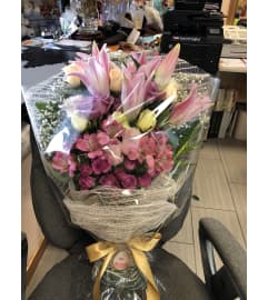 Graduation Bouquet. An arrangement by Flamingo Floral and Gifts.