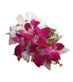 Wedding Purple Dendrobium Orchid Corsage. An arrangement by Burlington Flowers.