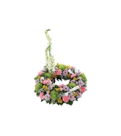 Sympathy Cremation/Memorial Floral Wreath. An arrangement by Burlington Flowers.