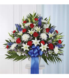Sympathy Standing Basket Blue, Red and White. An arrangement by Burlington Flowers.